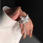 انگشتر زنانه نگین دار کارتیه Cartier طرح میخ فری سایز Freesize رنگ کاملا ثابت کد tk (پس کرایه)
