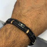 دستبند چرمی قفل و پلاک استیل مردانه کارتیر Cartier کیفیت چرم عالی تنوع طرح رنگ ثابت کدbn (پس کرایه)